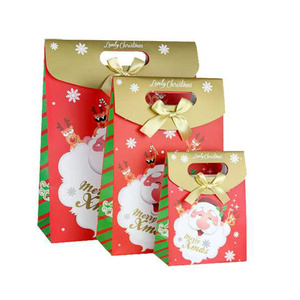 customized glossy colorful Christmas gift bag in Dongguan